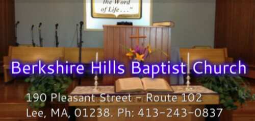 The altar at Berkshire Hills Baptist Church, set with flowers before a service.